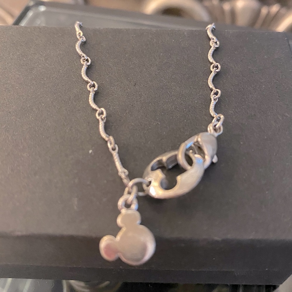 Silver Disney Mickey Mouse woman’s bracelet.